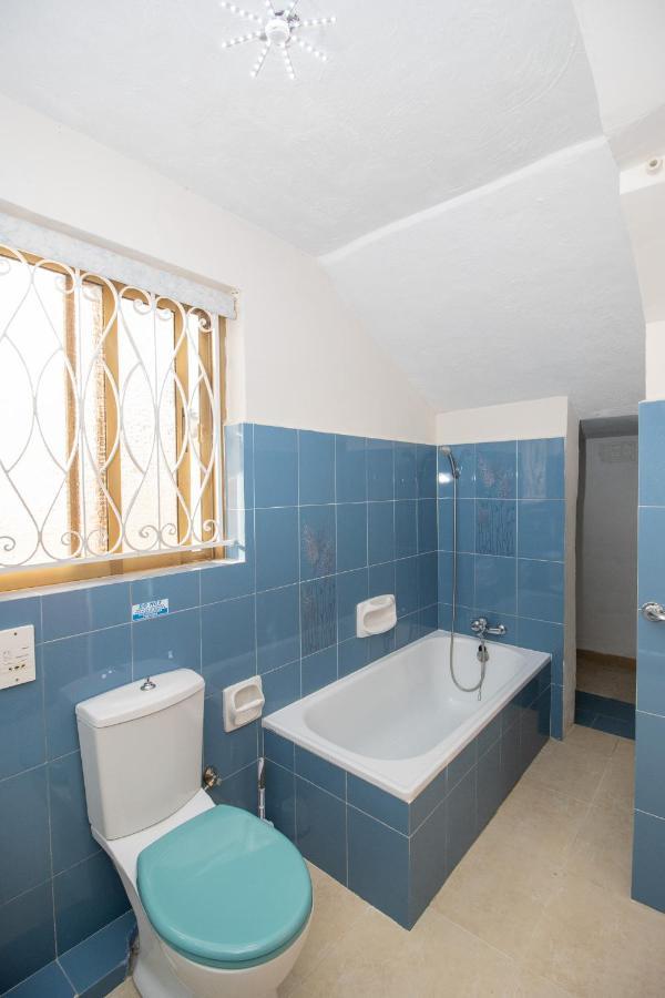Tranquil Villa Apartments Units Мелліха Екстер'єр фото