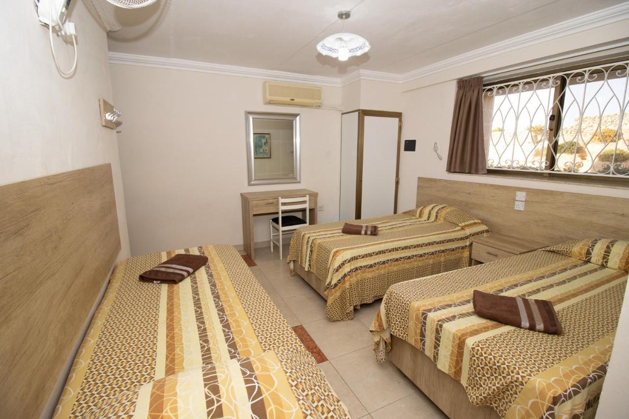 Tranquil Villa Apartments Units Мелліха Екстер'єр фото