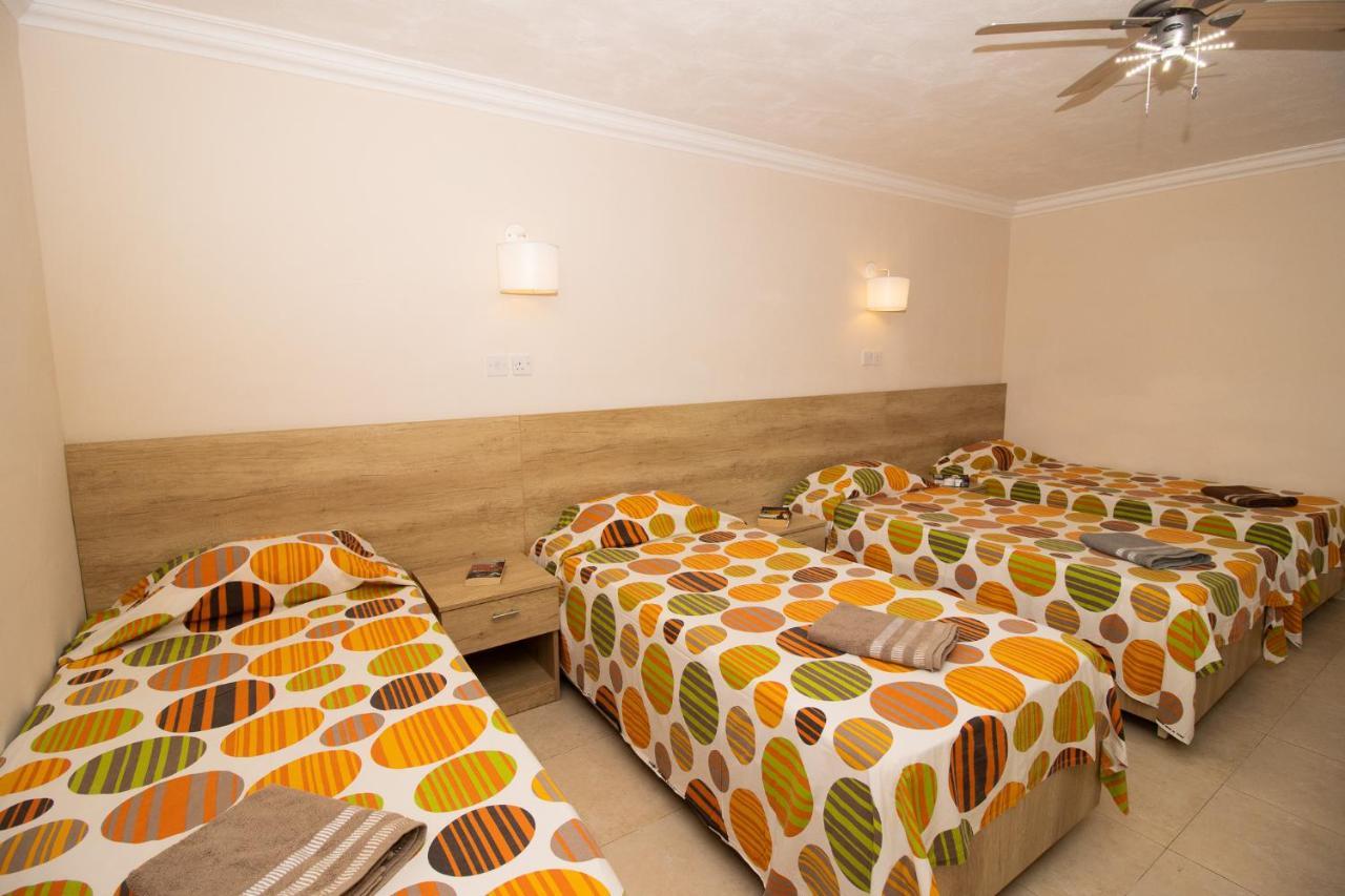 Tranquil Villa Apartments Units Мелліха Екстер'єр фото
